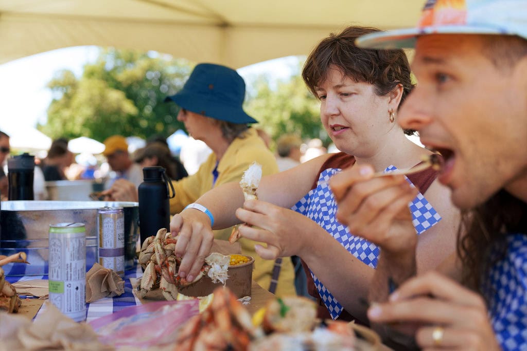 Visitors of CrabFest BC enjoying crab.