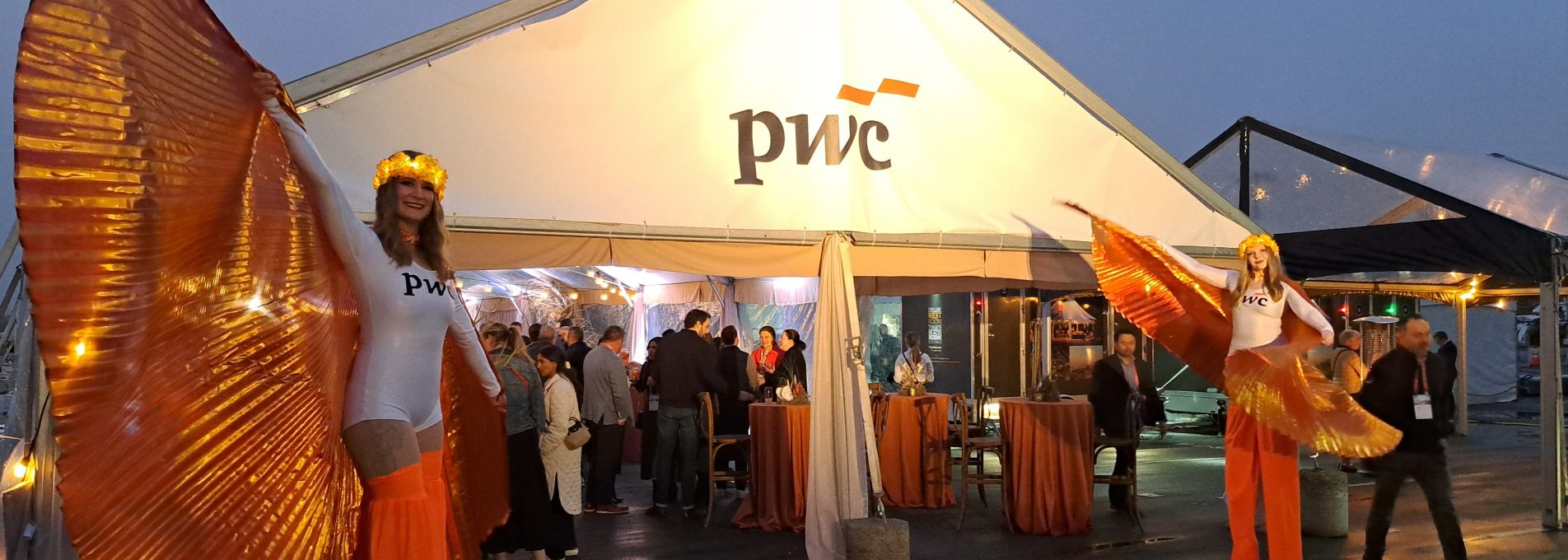 A stilt walker at a PriceWaterhouse Coopers event on Ship Point Pier